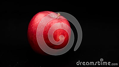 An apple on a black isolated background Stock Photo