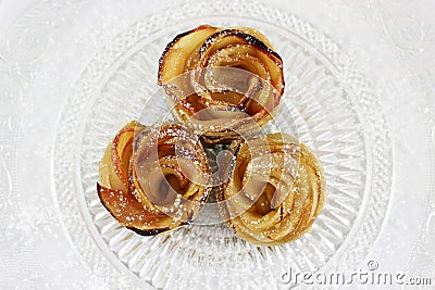 Apple cakes for Rosh HaShana on decorative plate Stock Photo