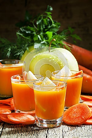 Apple-carrot fresh smoothies, vintage wooden background, selecti Stock Photo