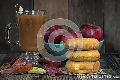 Apple cider and donuts with leaves Stock Photo