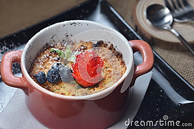 Apple crumble crackly cinnamon topping Stock Photo