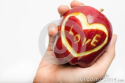 Apple,heart,love in woman hand isolate on white background Stock Photo