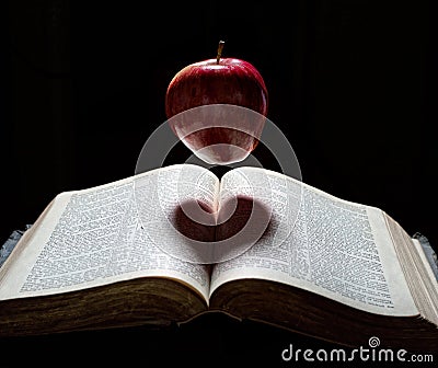 An apple with heart shadow Stock Photo
