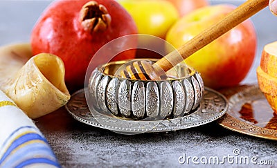 Apple and honey, kosher traditional food of jewish New Year Rosh Hashana talit and shofar Stock Photo