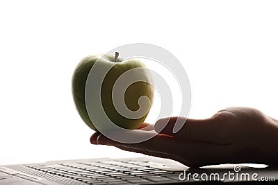 Apple, keyboard, hand Stock Photo