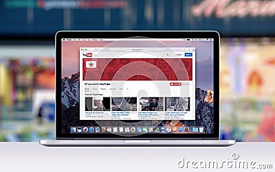 Apple MacBook Pro Retina with an open tab in Safari which shows Youtube web page Editorial Stock Photo