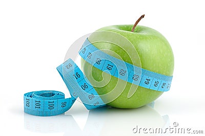 Apple with measuring tape Stock Photo