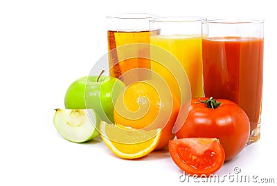 Apple orange and tomato fruits with juice in glass Stock Photo