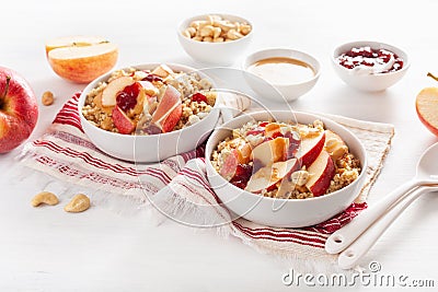 Apple peanut butter quinoa bowl with jam and cashew for healthy Stock Photo