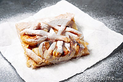 Apple Pie on disposable paper plate. Double crust apple pie with cinnamon Stock Photo