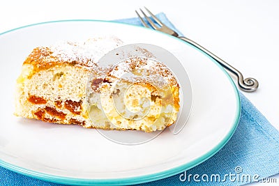 Apple pie with dried apricots on a white background Stock Photo