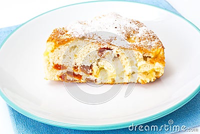 Apple pie with dried apricots on a white background Stock Photo