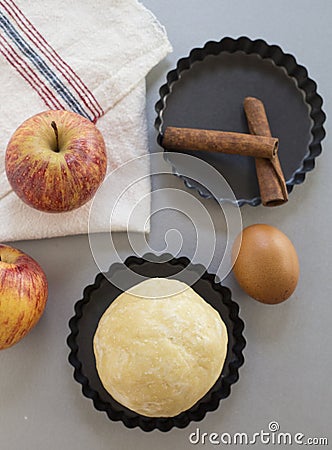 Apple pie ingredients. Dough, apple slices Stock Photo