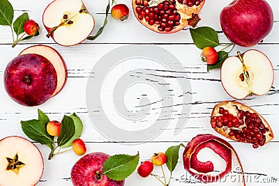 Apple, pomegranate and honey, traditional food of jewish New Year - Rosh Hashana. Copy space background. Stock Photo