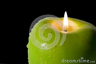 Apple-shaped candle Stock Photo