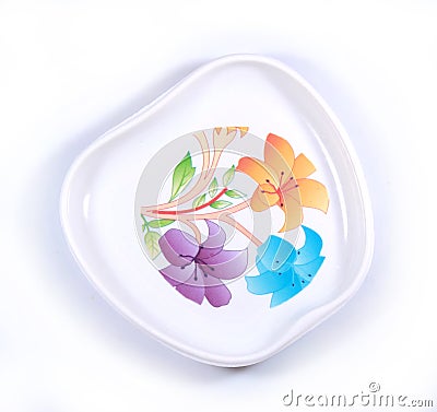 An apple shaped designer colourful food plate. Stock Photo