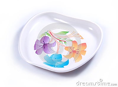 An apple shaped designer colourful food plate. Stock Photo