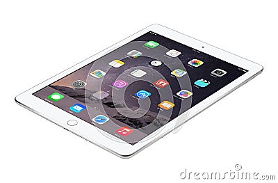 Apple Silver iPad Air 2 with iOS 8 lies on the surface, designed Editorial Stock Photo