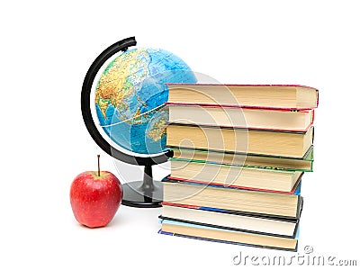 Apple, stack of books and globe on white background. Stock Photo