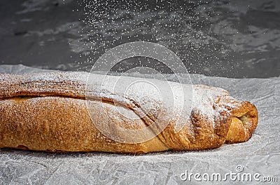 Apple strudel with raisins and almonds. view from above. Stock Photo