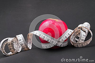 Apple and tapeline Stock Photo