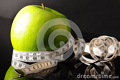 Apple and tapeline Stock Photo