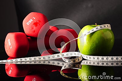 Apple and tapeline Stock Photo