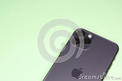 Apple technique green smartphone iPhone 11 with 3 three cameras on back panel. Editorial Stock Photo