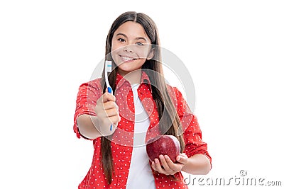 Apple vitamins for healthy teeth. Portrait of happy smiling teenage child girl. Stock Photo