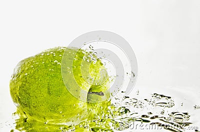 Apple in water Stock Photo