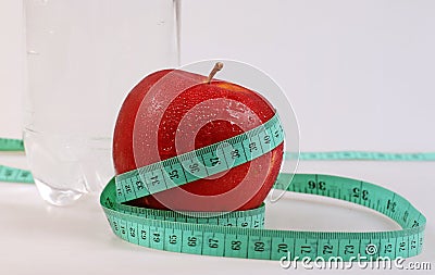 Apple,water and measurement Stock Photo