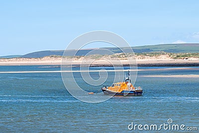 APPLEDORE, ENGLAND - JULY 19, 2020: Moored Royal National Lifeboat Institution RNLI vessel. Editorial Stock Photo