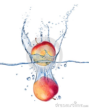 Apples falling under water with a splash on white Stock Photo