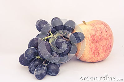Apples and grapes on a white background Stock Photo