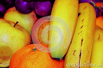 Apples, tangerines, grapes and banana. Background of different fruits Stock Photo