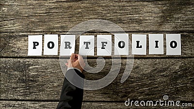 Applicant for a job opportunity assembling a word PORTFOLIO Stock Photo