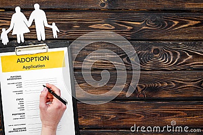 Application form for adopt child on wooden background top view mock up Stock Photo