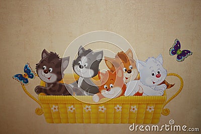 Applique with a basket of kittens Stock Photo