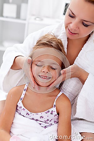 Applying face cream Stock Photo