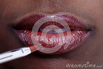 Applying Lip-gloss Stock Photo