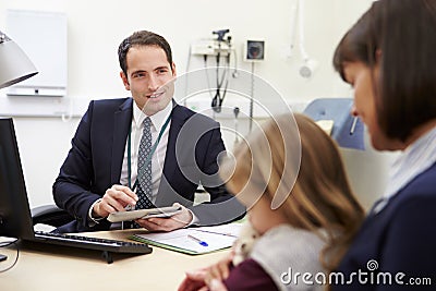 Appointment For Mother And Daughter With Doctor Stock Photo