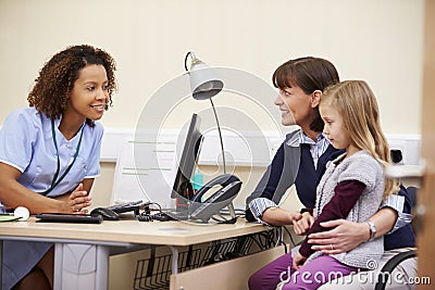 Appointment For Mother And Daughter With Nurse Stock Photo