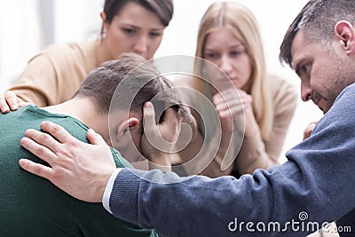 Appreciating the helping hand of his friends Stock Photo
