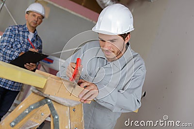 apprentice being evaluated Stock Photo