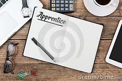 Apprentice note on Office desk with computer technology, high an Stock Photo