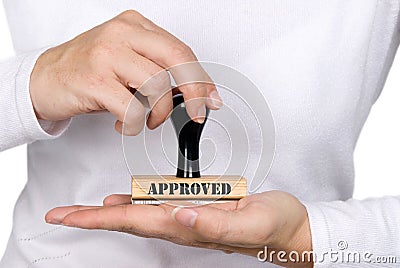 Approval Stamp and woman Stock Photo