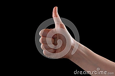 Approval thumbs up like sign as caucasian hand gesture isolated over black Stock Photo