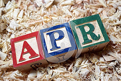 APR annual percentage rate acronym on wooden block Stock Photo