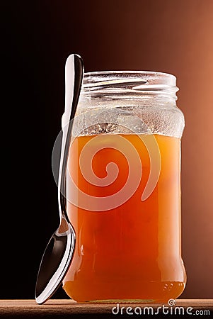 Apricot jam and tea spoon Stock Photo