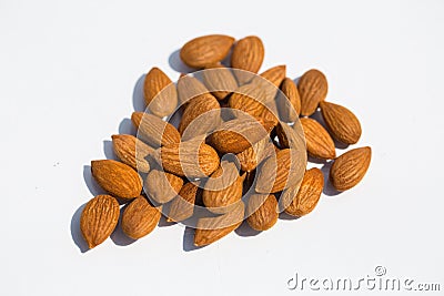 Apricot kernels on white background Stock Photo